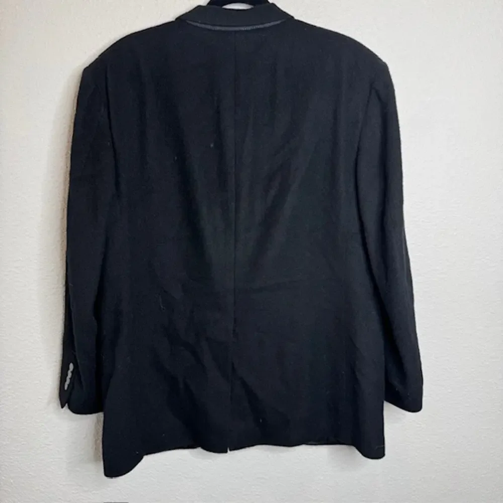 Justers Clothier front flap
